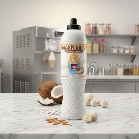 Butelka syropu MAXFLURRY o smaku orzechowym (nocciolo) z dodatkowymi składnikami, takimi jak orzechy i karmel.
